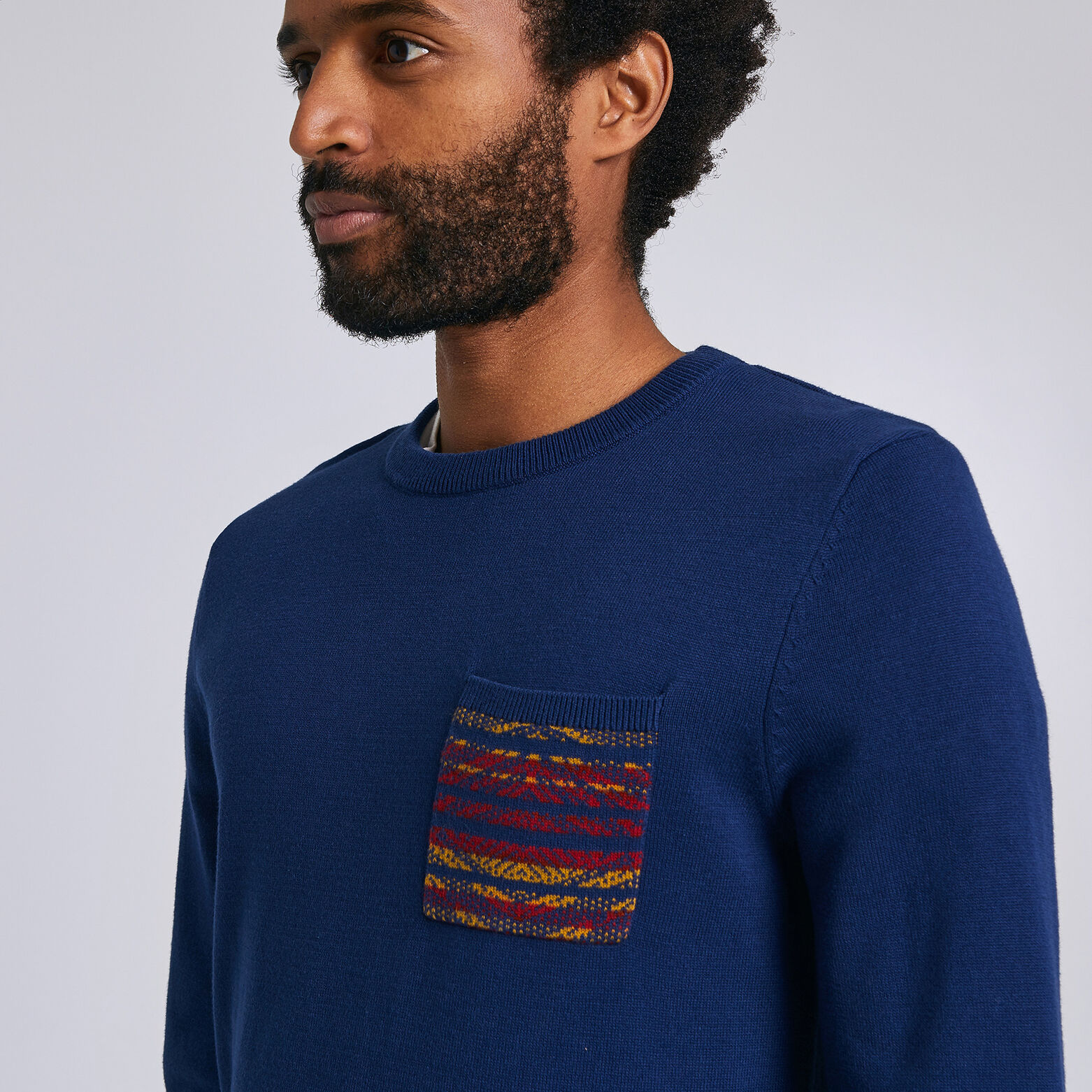 Pull jersey poche Jacquard