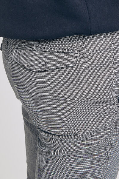 Pantalon chino slim faux uni